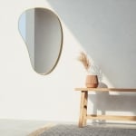 Огледало за стена HUBBA PEBBLE, цвят месинг, UMBRA Канада